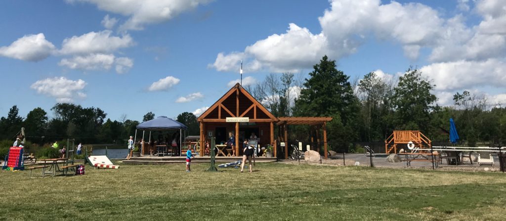 a large field covered with family games at Branches of Niagara campground
