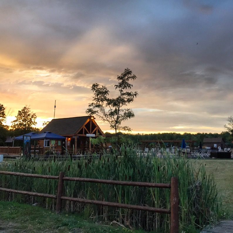 a sunset fills the skies above  Branches of Niagara campground